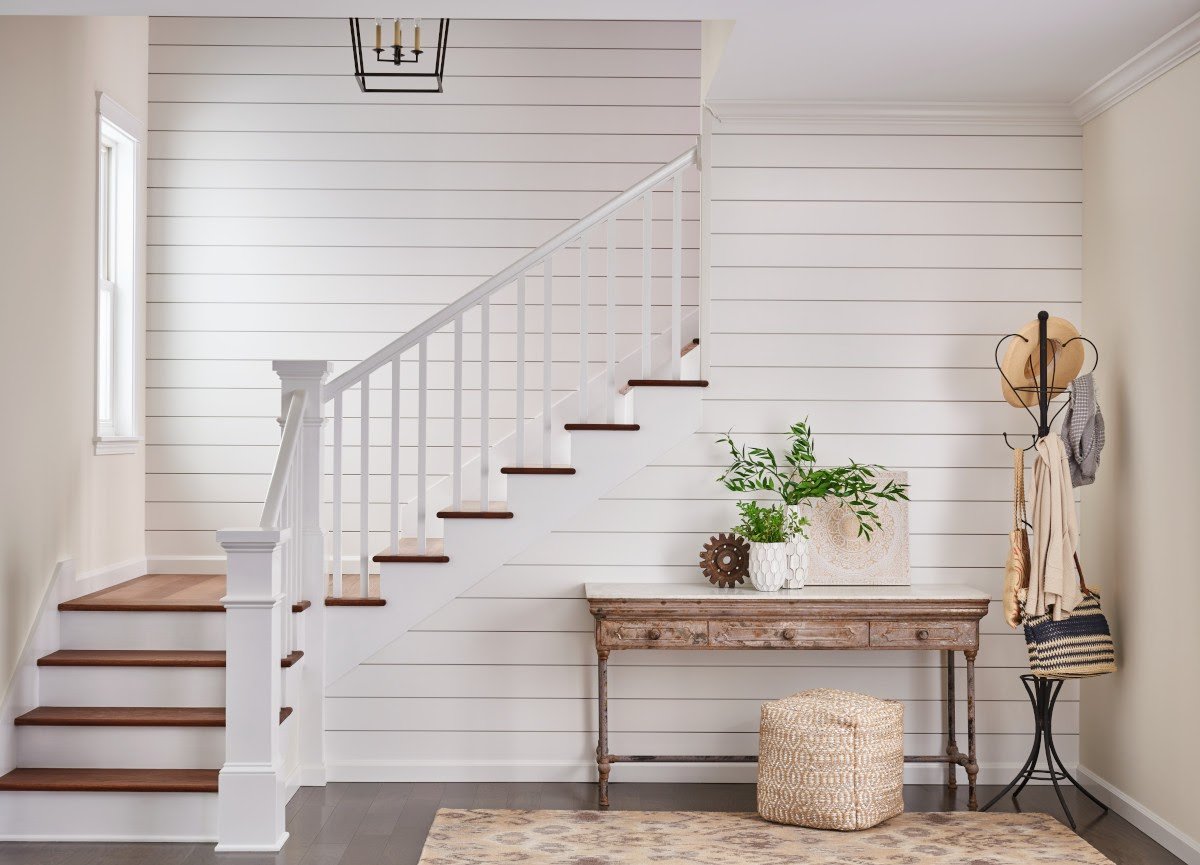 Entryway Staircase with White Shiplap Walls