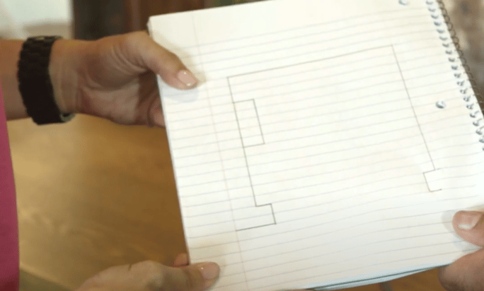 A Drawing of a Room Layout on Notebook Paper